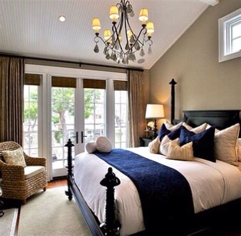 beige vs navy blue bedroom.